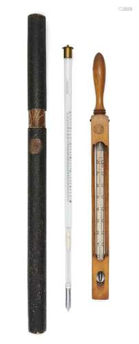 Two Continental thermometers comprising: a Danish fruitwood ...