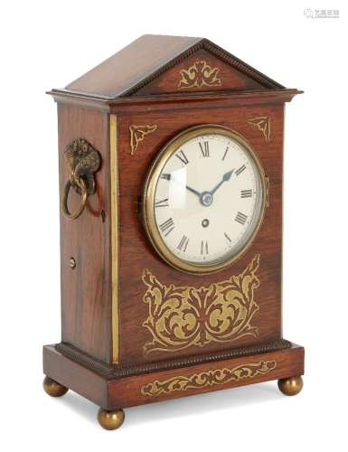 A rosewood and brass inlaid mantel clock, early 19th century...