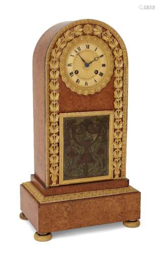 A French amboyna and ormolu mounted mantel clock, by Baullie...