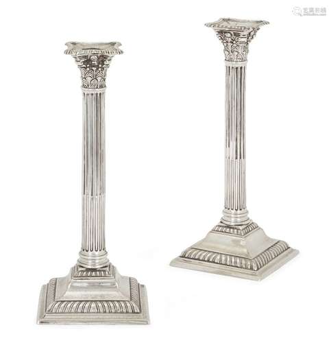 A pair of George III Paktong candlesticks, circa 1760-80, ea...