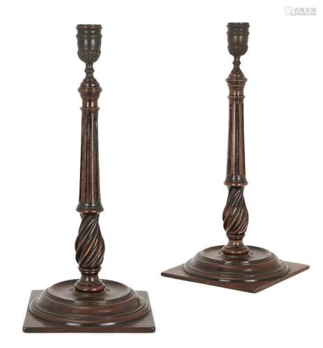 A pair of George III style mahogany candlesticks, 20th centu...
