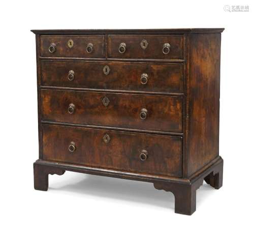 A George I walnut chest of drawers, circa 1720, mahogany cro...