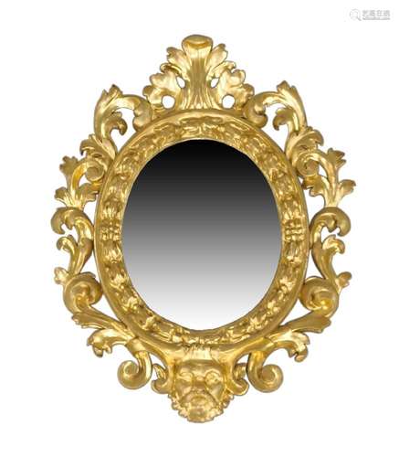 An Italian carved giltwood mirror, late 18th century, with c...