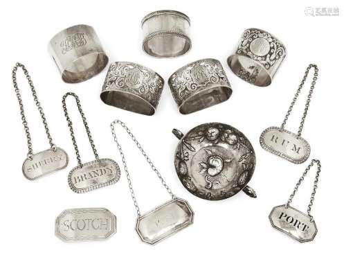 Six silver decanter labels including two oval George III exa...