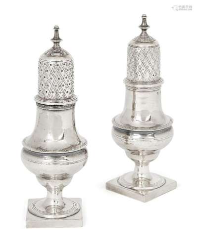 A pair of Georgian silver casters