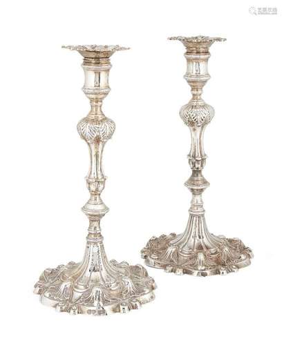 A matched pair of silver candlesticks