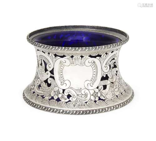 A George V silver potato dish ring with blue glass liner