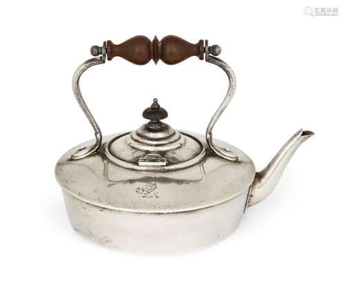 An Edwardian silver tea kettle