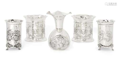 Five silver putti-decorated Victorian and Edwardian vases co...