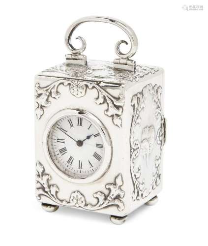 A small Edwardian silver boudoir clock