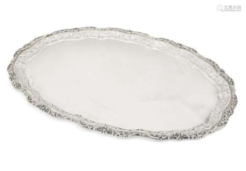 A shaped oval tray with pierced sides