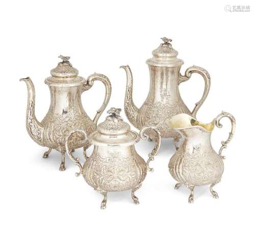 A floral chased four piece tea set