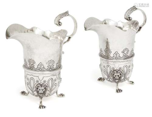 A pair of Portuguese silver cream jugs