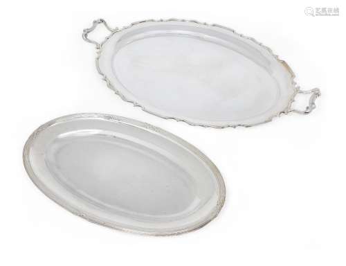 A French oval silver serving dish with reeded crossover bord...