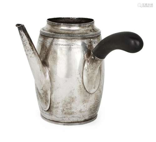 A silver chocolate pot with side handle