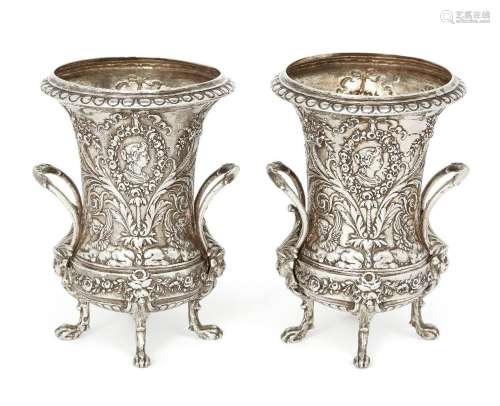 A pair of small Continental silver vases