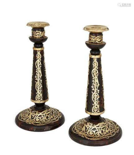 A pair of Victorian silver gilt mounted tortoiseshell candle...