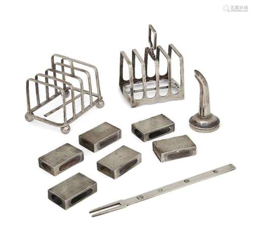 A group of silver comprising: two silver toast racks