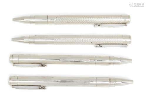 Two cased pairs of silver ballpoint pens