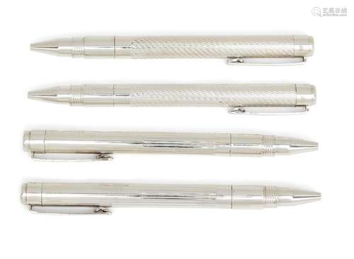 Two cased pairs of silver ballpoint pens