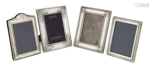 Four silver mounted photo frames