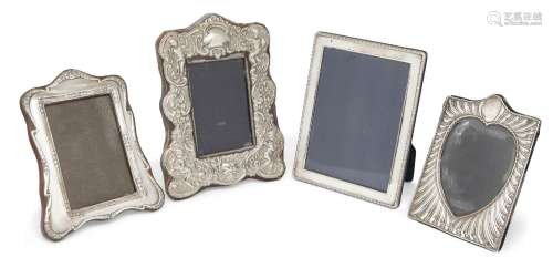 Three silver mounted photo frames comprising: a late Victori...