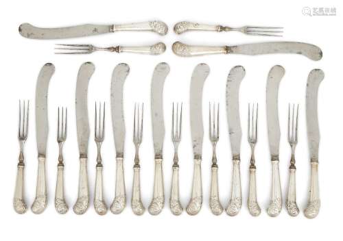 A set of 18th century table knives and three pronged forks