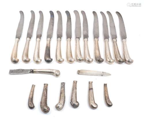 A set of silver handled pistol grip table knives
