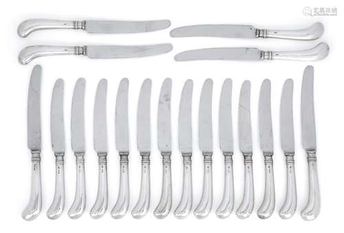 Eighteen pistol grip silver handled knives