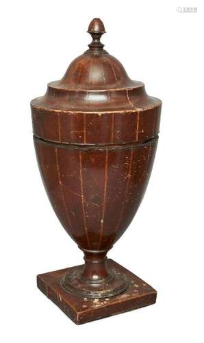 A Georgian urn-shaped mahogany knife/spoon box