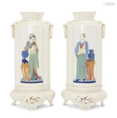 A pair of unmarked Chinoiserie white glazed porcelain vases