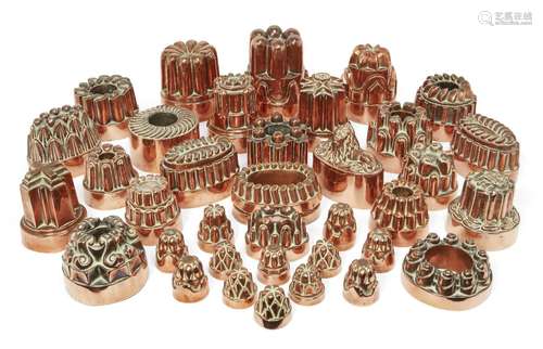 A collection of thirty-eight copper jelly moulds