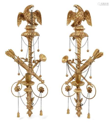 A pair of George III carved giltwood single branch wall ligh...