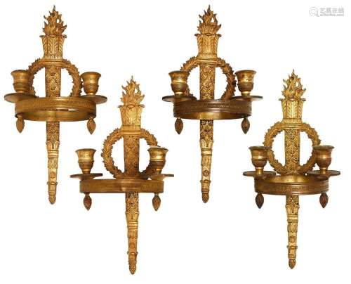 A set of four French gilt-bronze twin-light wall appliques