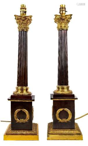 A pair of gilt and patinated bronze Corinthian column table ...