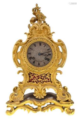 A French gilt bronze Rococo Revival mantel clock
