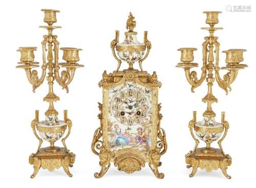 A French ormolu and porcelain mounted clock garniture