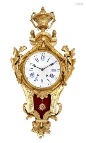 A large French gilt-bronze cartel clock