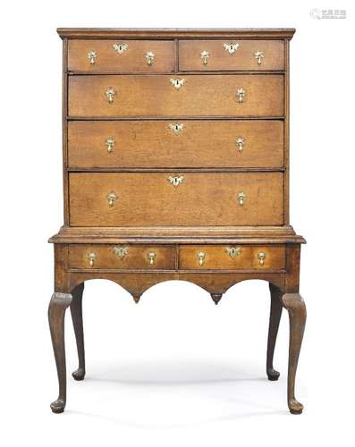 A Queen Ann oak chest on stand