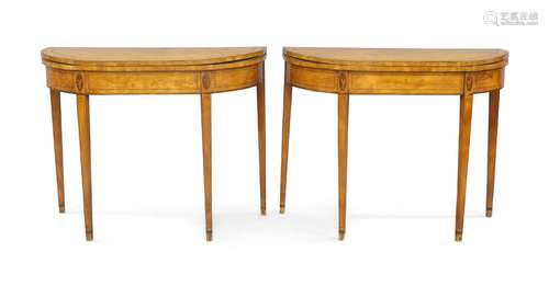 A pair of George III satinwood D shaped card tables