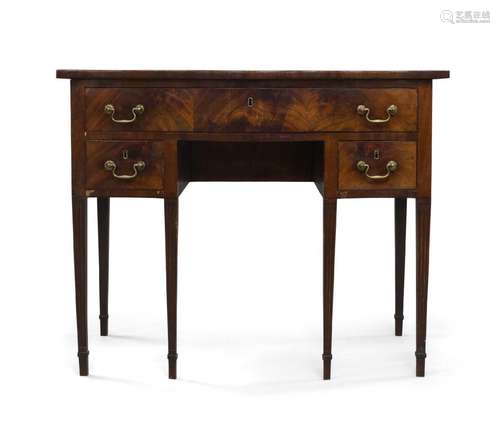 A George III mahogany serpentine dressing table