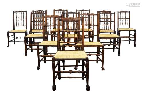 A set of twelve ash and elm fan backed chairs