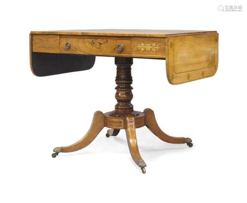 A Regency rosewood and brass-inlaid sofa table