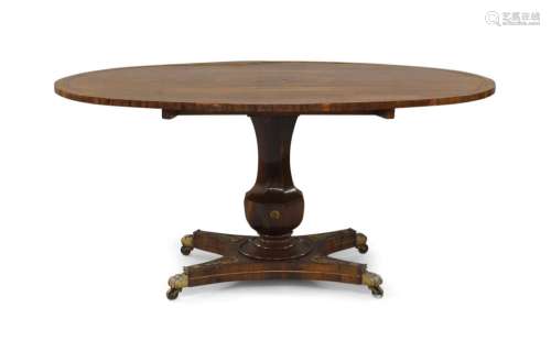 A Regency rosewood tilt top breakfast table