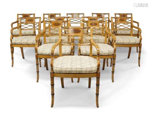A set of twelve Regency style caned beech chairs