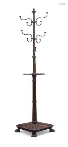 A Victorian revolving cast iron coat and stick stand