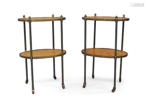 A pair of French oval brass side tables