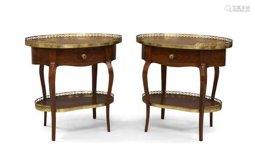 A pair of French style kingwood oval side tables