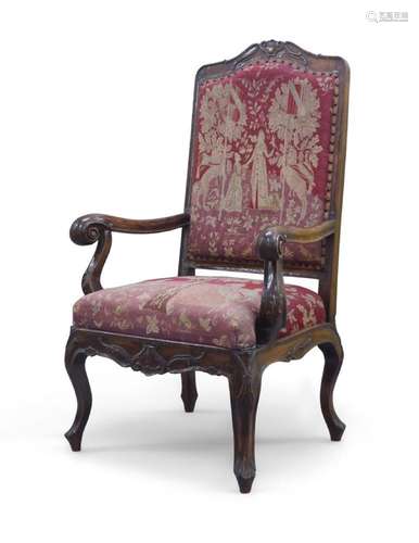 A French walnut framed scroll armchair