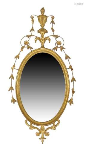 A George III oval giltwood wall mirror